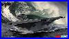 Aircraft-Carrier-And-Battleship-Sails-Through-Huge-Waves-During-Massive-Storm-At-High-Speed-01-luk